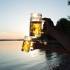People drinking beer at the Ammersee in the hinterland of Munich.