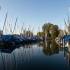Covered boats in a small harbour at Starnberger See in the Five Lake Region nearby Munich.
