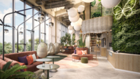 Cocoon Lounge an der Theresienwiese in M&uuml;nchen mit roten Sofas und Fensterwand.