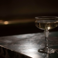 A glass of champagne at the bar The High in Munich.