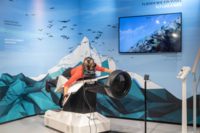 Eine Person auf dem VR-Flugsimulator Birdly im BIOTOPIA Lab.