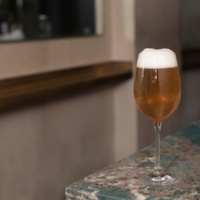 A glass of beer at the bar The High in Munich.