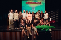 Participants of the Cinecopropitch on stage at the Munich Film Festival.