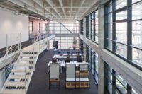 Der Innenraum des Munich Urban Colab mit B&uuml;rotischen und Computern