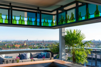 Ein Ausblick von einer Dachterasse &uuml;ber die Stadt M&uuml;nchen.