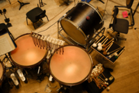 Various drums and other musical instruments on a stage