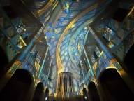 The interior of St. Mark's Church in Munich is illuminated by the INFINITY light show.