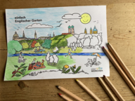 München Ausmalbild auf Holztisch mit Buntstiften