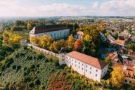 An aerial view of Dachau Castle in autumn.