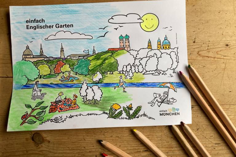 Munich painting on wooden table with crayons