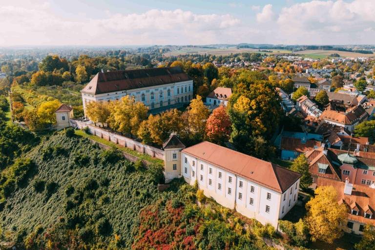 An aerial view of Dachau Castle in autumn.